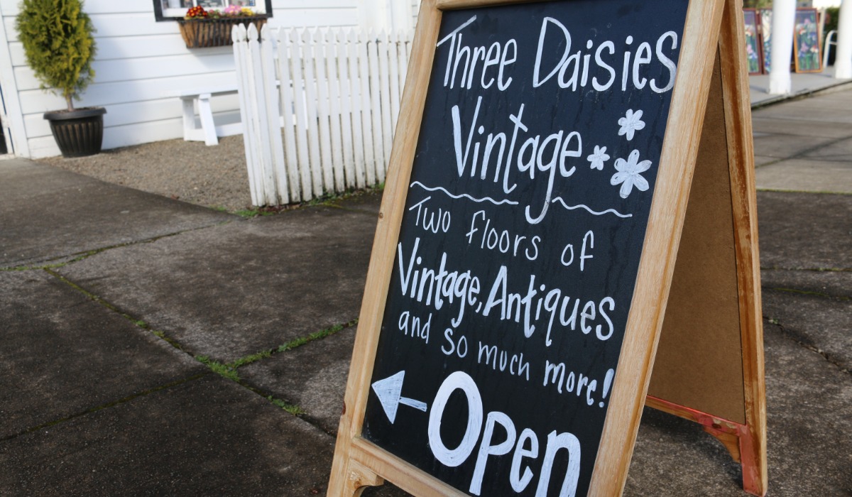 Sidewalk sign advertising vintage store